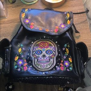 Real leather backpack. Flower & skull embroidery